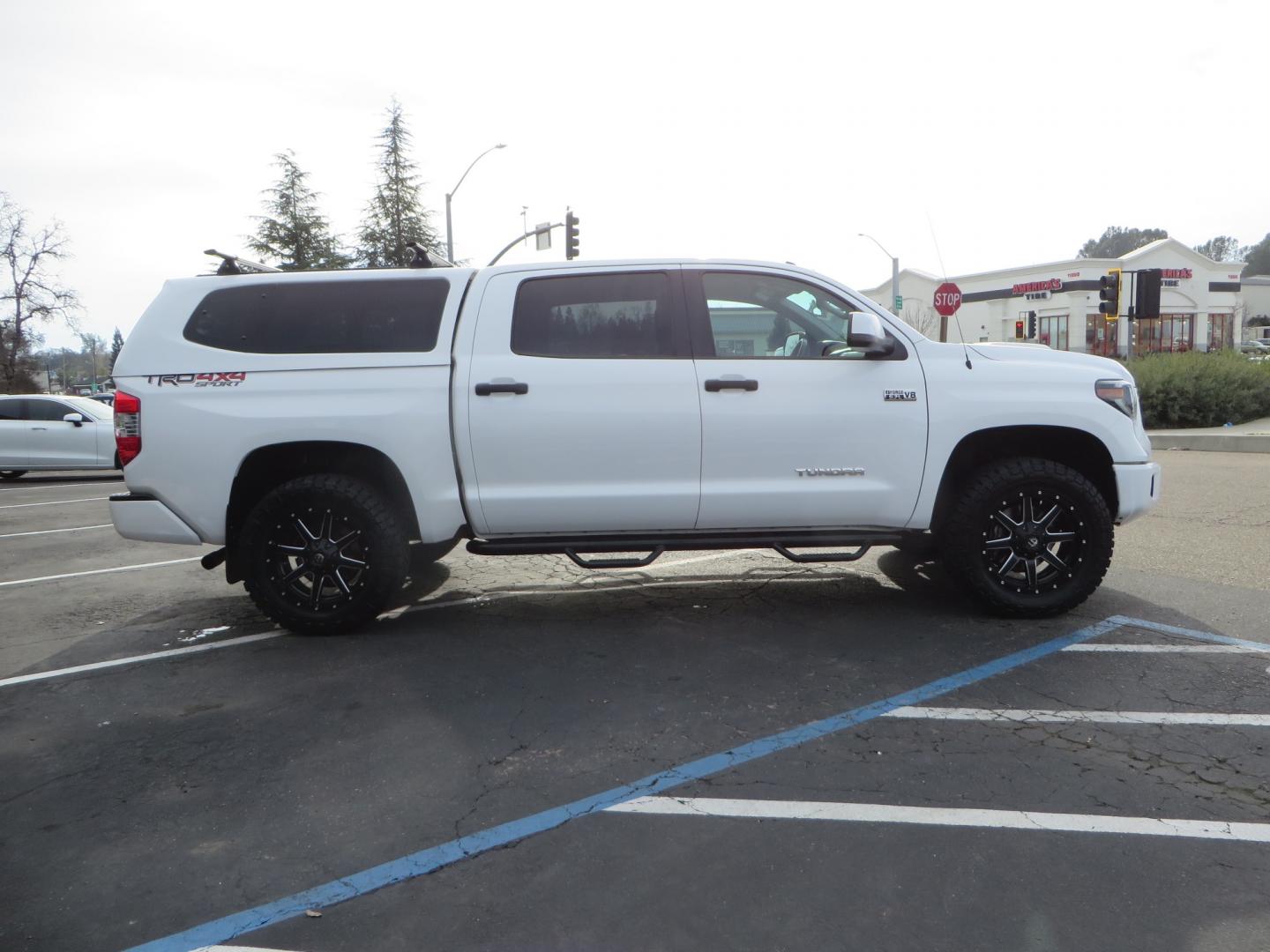 2019 White /BLACK Toyota Tundra SR5 5.7L V8 CrewMax 4WD (5TFDY5F19KX) with an 5.7L V8 DOHC 32V engine, 6A transmission, located at 2630 Grass Valley Highway, Auburn, CA, 95603, (530) 508-5100, 38.937893, -121.095482 - Clean leveled Tundra with 20" Fuel Maverick wheels, Nitto Ridge Grappler tires, N-Fab running boards, Snug Top camper shell with Yakima racks. - Photo#3